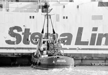 Tug meeching Newhaven harbour